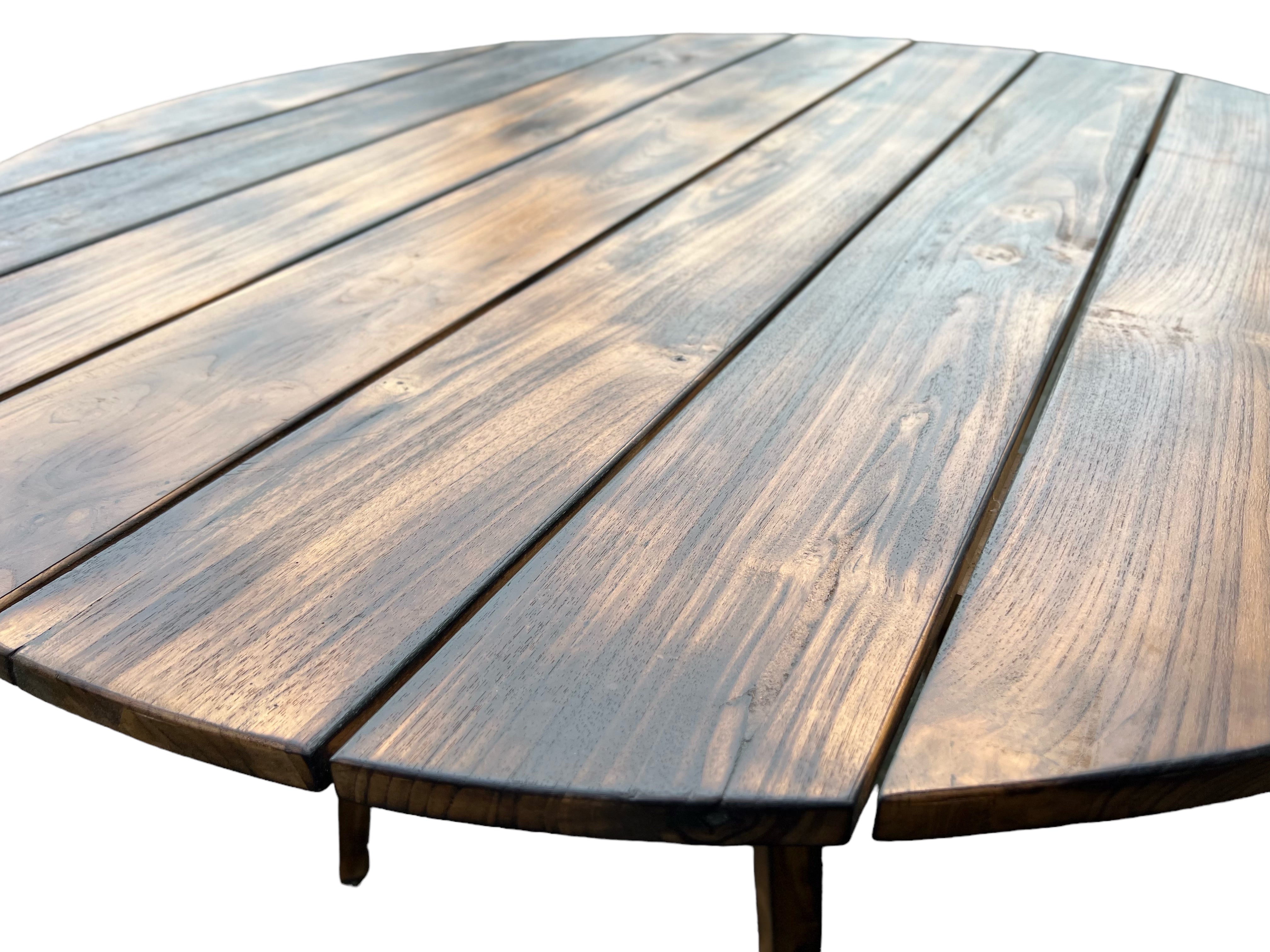 Table de jardin en teck fabriquée à la main - Pièce unique au charme naturel pour l'intérieur et l'extérieur - Flammée - 120 et 150 cm de diamètre - 80 cm de hauteur 