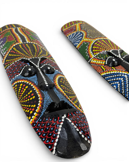 Unique piece: Handmade teakwood mask with a colorful polka dot pattern