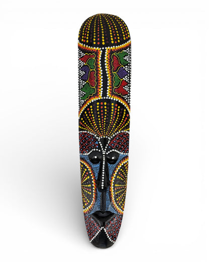 Unique piece: Handmade teakwood mask with a colorful polka dot pattern